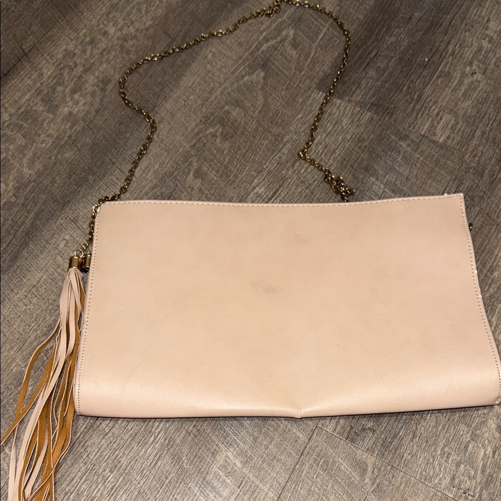 Chic Cream Clutch with Tassel Accent